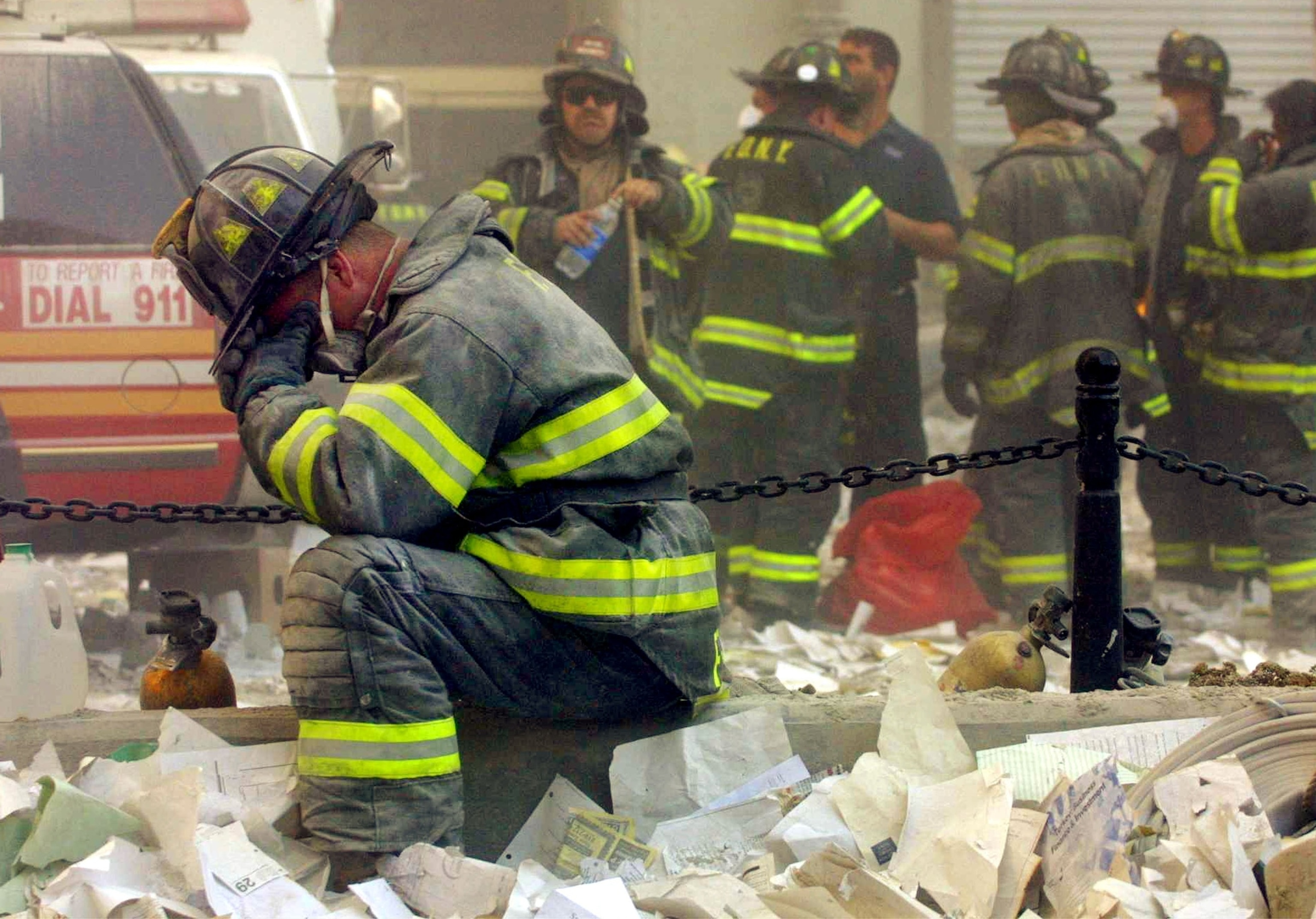 PHOTO: Firefighter McGibbon, of Engine 283 in Brownsville, Brooklyn, prays after the World Trade Center buildings collapsed Sept. 11, 2001 after two hijacked airplanes slammed into the twin towers in a terrorist attack that killed almost 3,000 people.