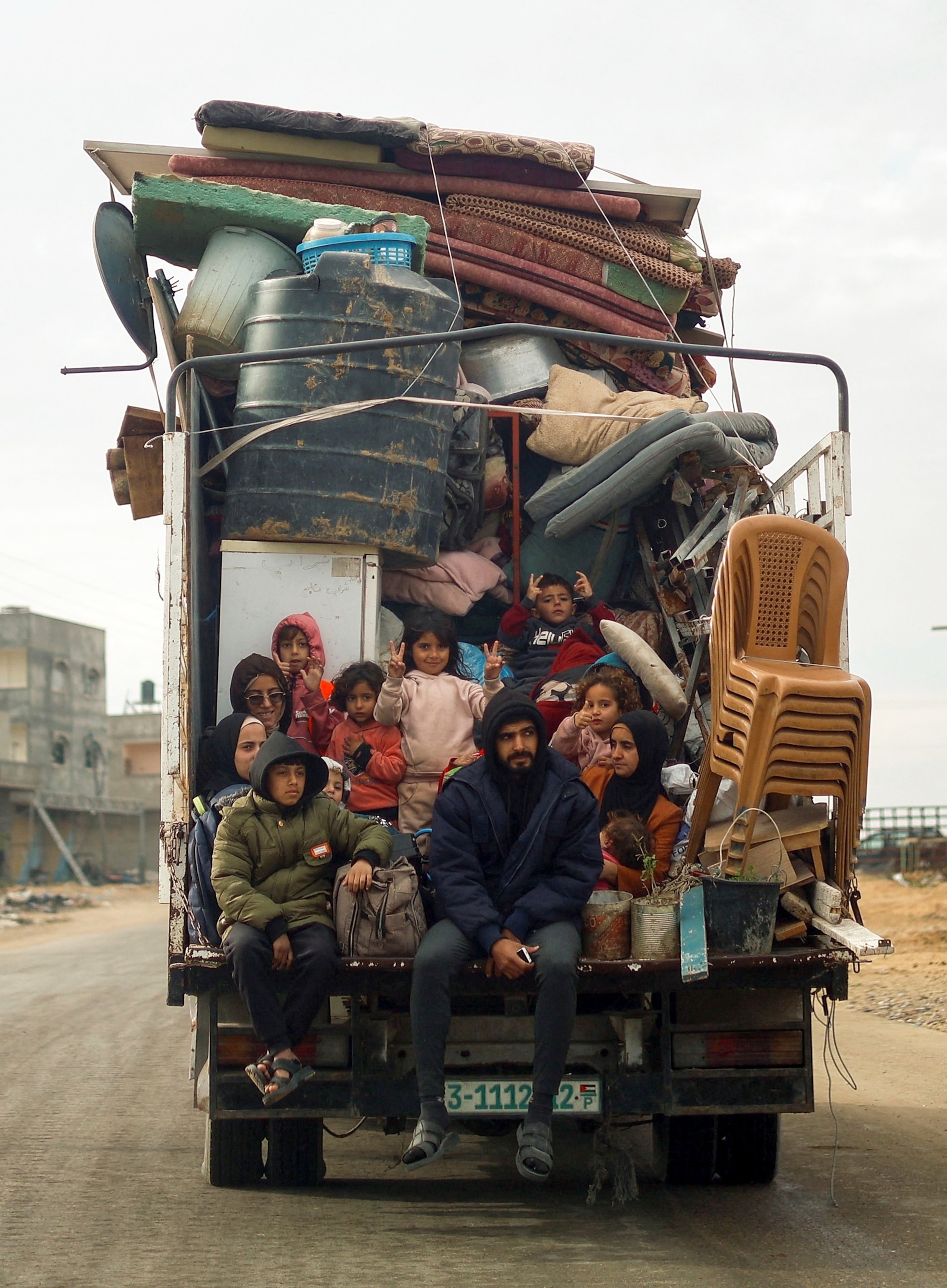 PHOTO: Displaced Palestinians travel in a truck as they return to their house, following a ceasefire between Israel and Hamas, in Rafah in the southern Gaza Strip, Jan 22, 2025.