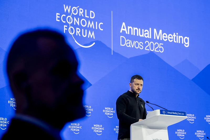 Ukraine's President Volodymyr Zelensky delivers a speech during the World Economic Forum (WEF) annual meeting in Davos on January 21, 2025. (Photo by FABRICE COFFRINI / AFP) (Photo by FABRICE COFFRINI/AFP via Getty Images)