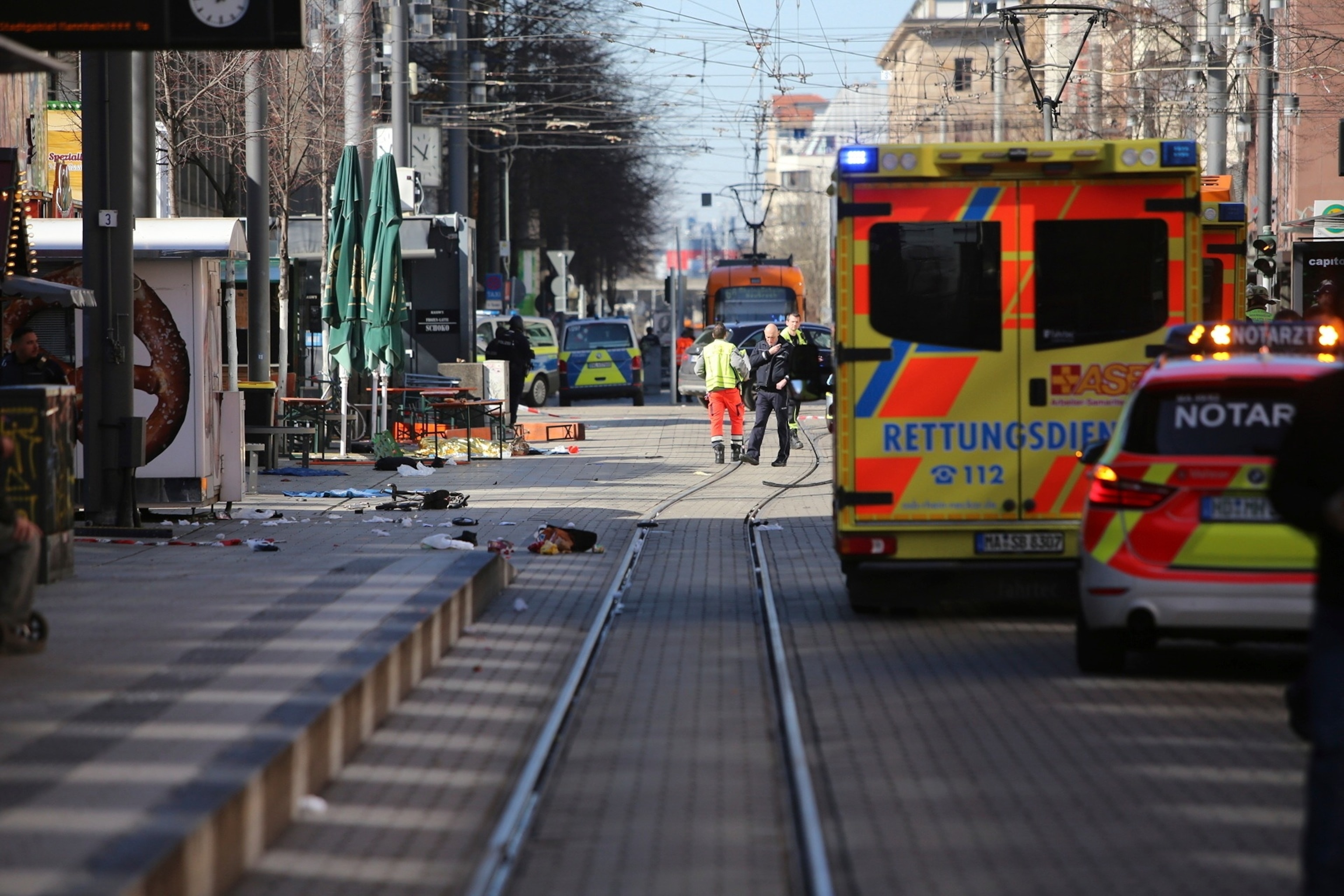 PHOTO: Emergency services and police stand at Paradeplatz in Mannheim, Germany, March 3, 2025. 