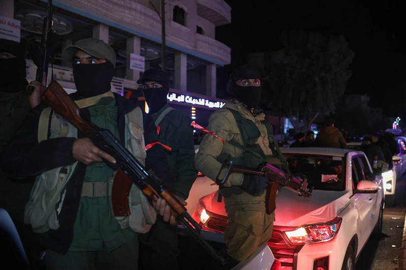 Members of Syria's new security forces prepare to depart from the northwestern city of Idlib, as reinforcement for the coastal area on March 8, 2025. Syrian security forces deployed heavily in the Alawite heartland on the country's Mediterranean coast on March 8, after a war monitor reported that government and allied forces killed nearly 750 civilians from the religious minority in recent days. (Photo by Omar HAJ KADOUR / AFP) (Photo by OMAR HAJ KADOUR/AFP via Getty Images)