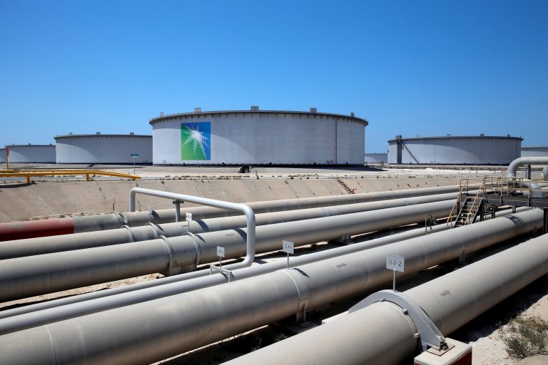 Saudi oil giant Aramco posts drop in full-year profit, slashes dividend