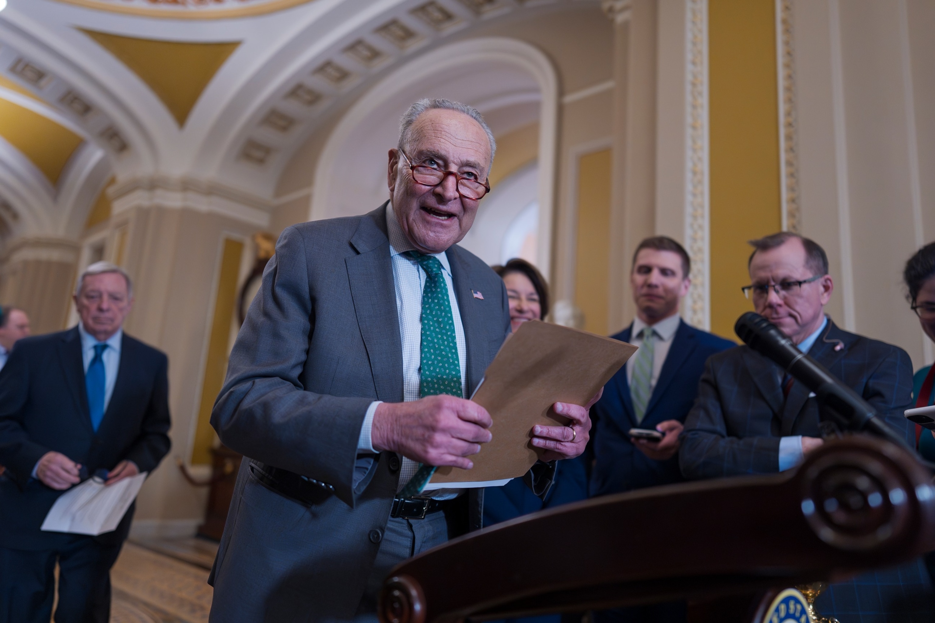 PHOTO: Senate Minority Leader Chuck Schumer, arrives to speak with reporters as Republicans work to pass an interim spending bill that would avoid a partial government shutdown at the Capitol, March 11, 2025. 