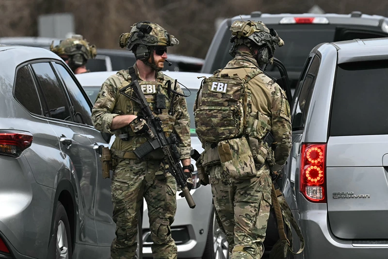 Members of law enforcement respond to reports of an armed individual near the Central Intelligence Agency (CIA) headquarters on March 19, 2025 in Langley, Virginia. The CIA is reportedly on lockdown as a SWAT team and other agencies respond. (Photo by SAUL LOEB / AFP) (Photo by SAUL LOEB/AFP via Getty Images)